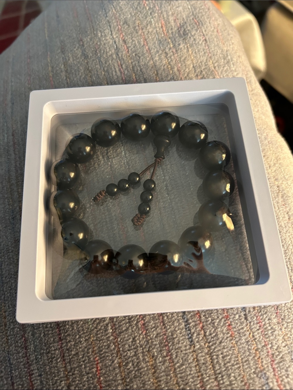 Polished Black Beaded Stretch Bracelet with Knotted Tassel-Mala